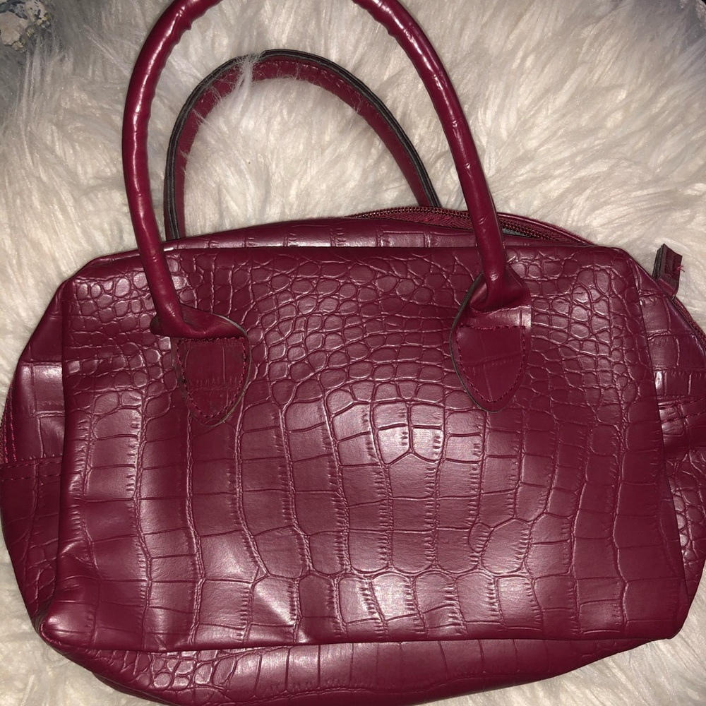 Burgundy crocodile print bag